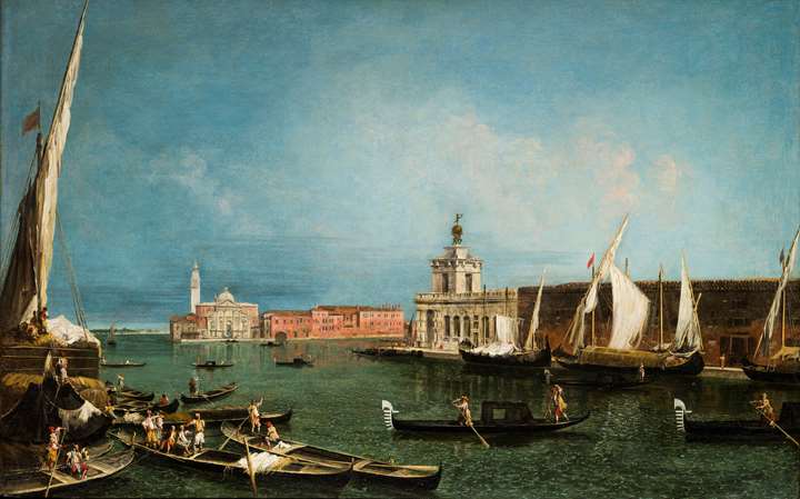 The Punta della Dogana from the Ca’Giustinian, looking South across the Bacino di San Marco towards the Church of San Giorgio Maggiore .